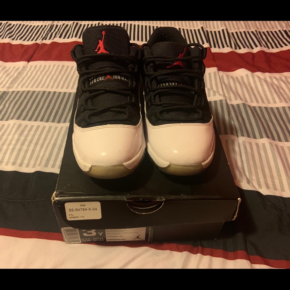 Jordan 11s low Tuxedos